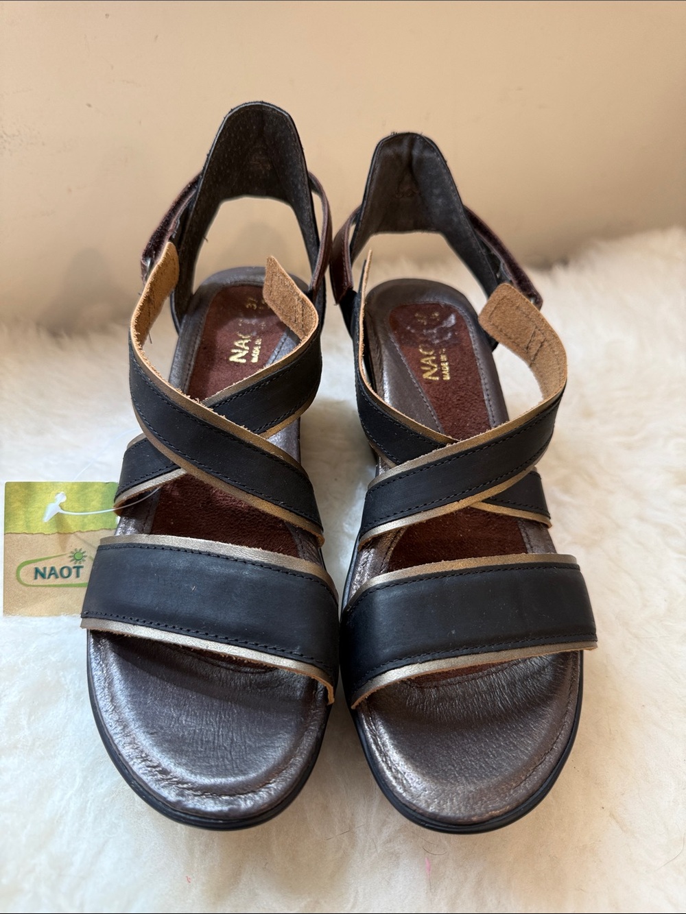 Naot Black Leather Crisscross Strap Sandals with Tan Trim